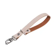 the-hantler-wrist-strap-ivory-brass.jpg